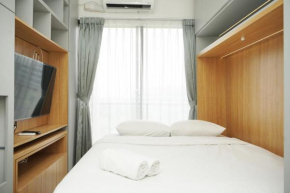 Minimalist and Cozy Studio at Sky House BSD Apartment By Travelio